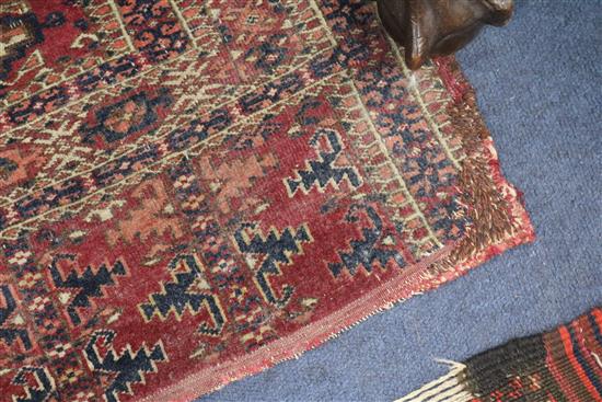 A Shiraz rug, a Bokhara saddlecloth and another rug (wear)